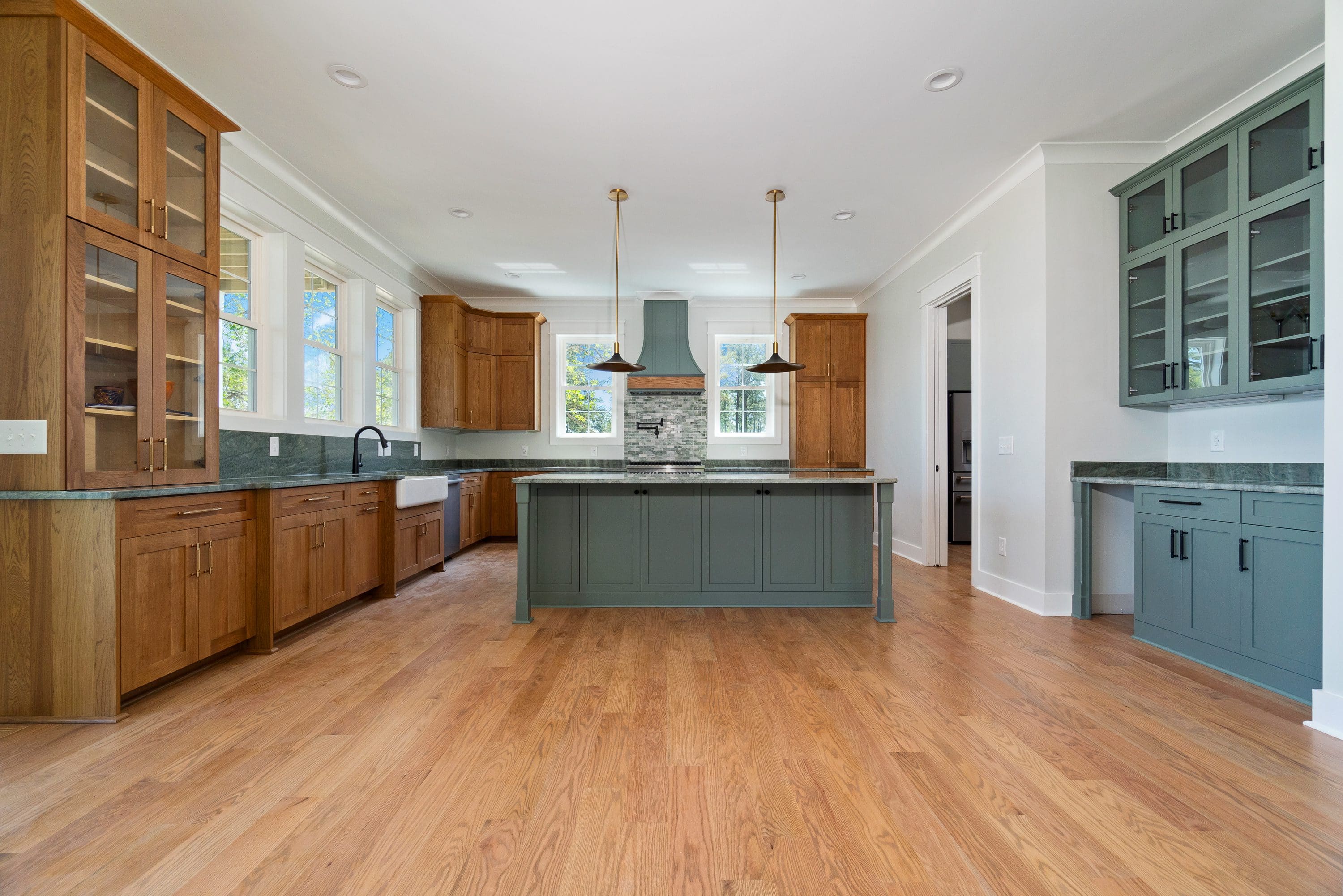 Spacious kitchen with wooden cabinets