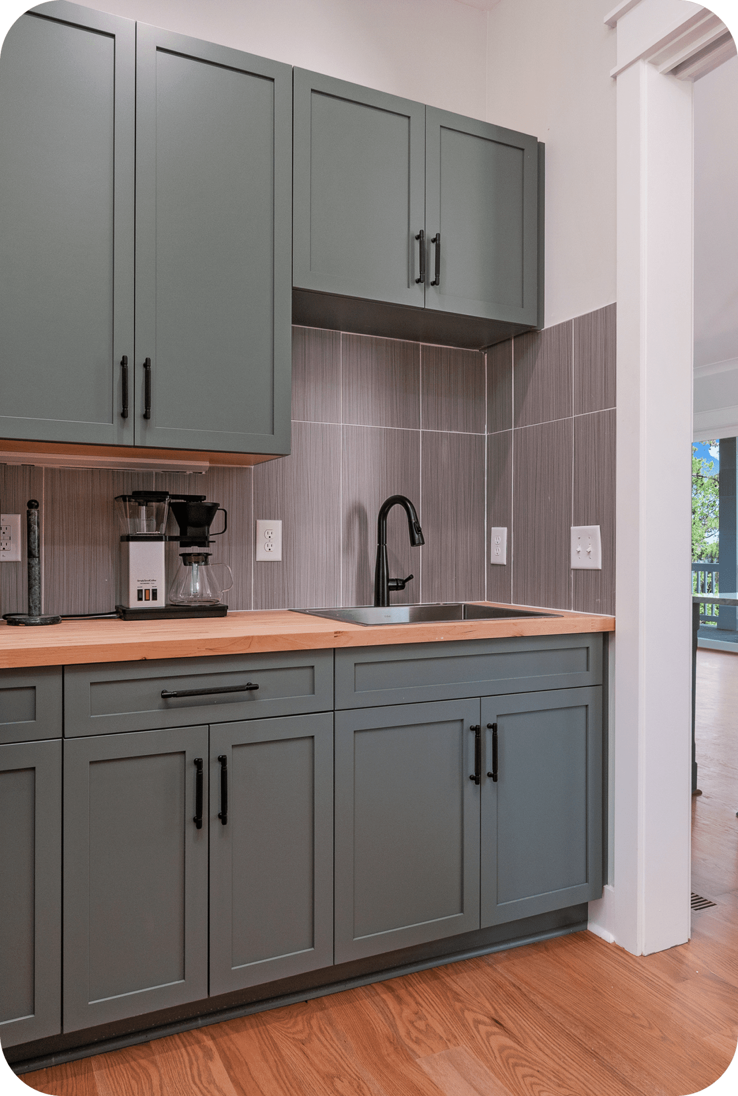 Small kitchen corner with wooden countertop
