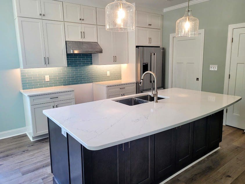 Contemporary kitchen design with blue backsplash