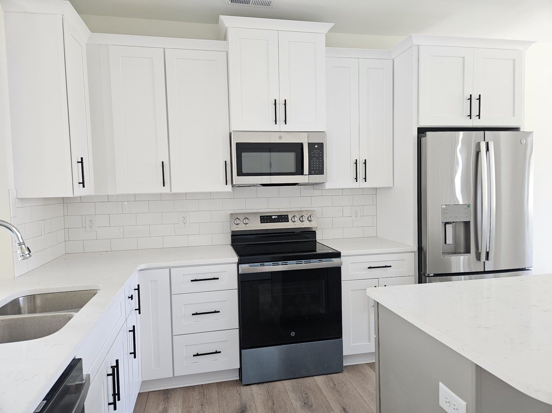 Modern kitchen with white cabinets
