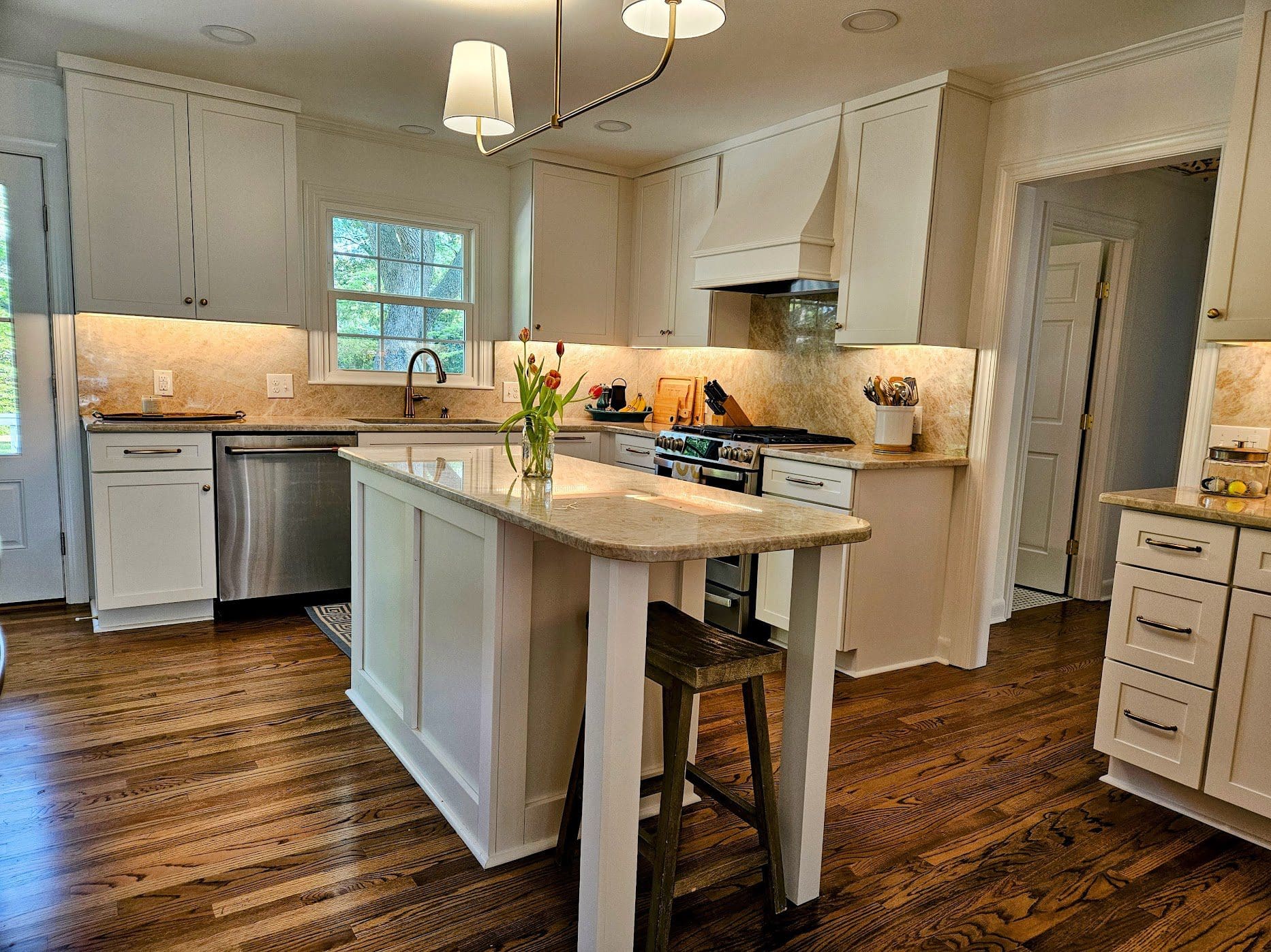Contemporary kitchen design with marble countertops