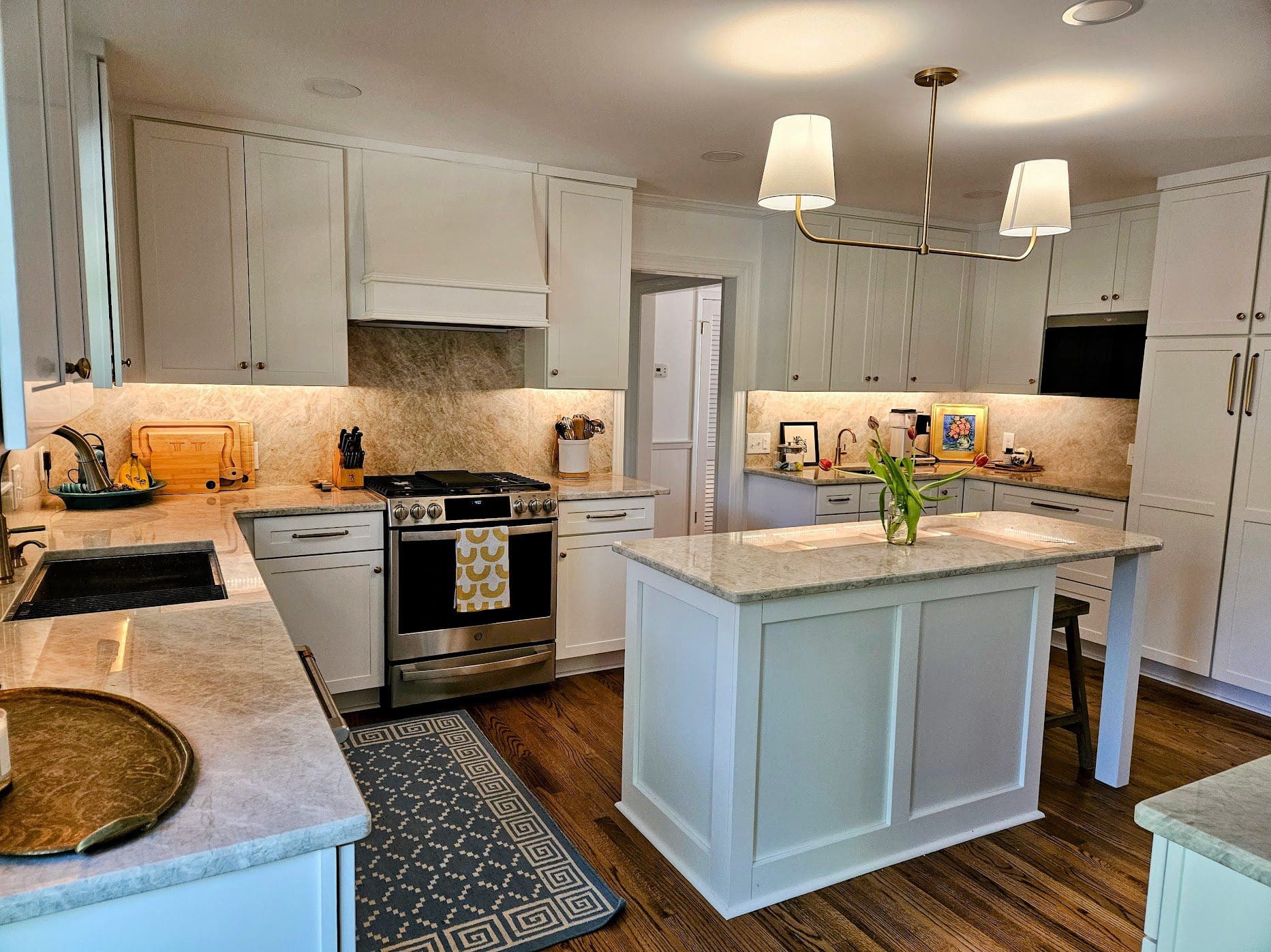 Contemporary kitchen design with overhead lighting