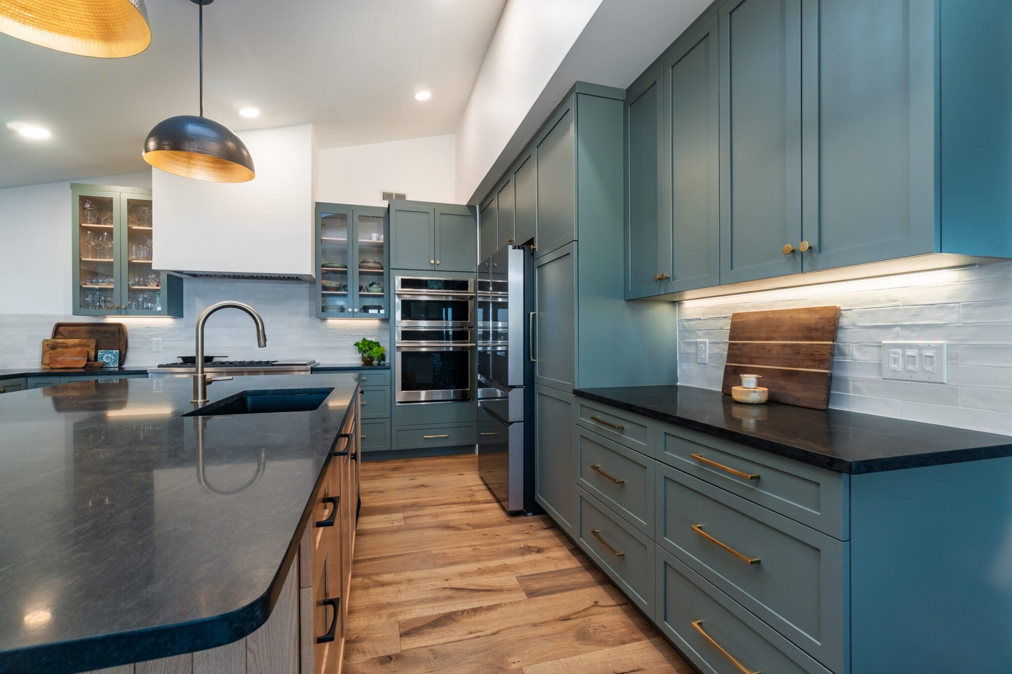 Spacious kitchen with island and pendant lights