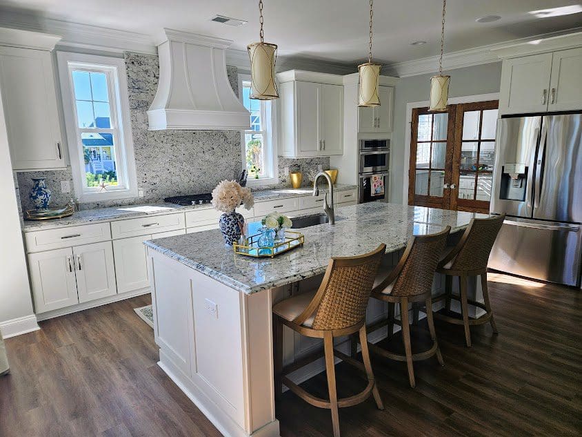 Elegant white kitchen design with island